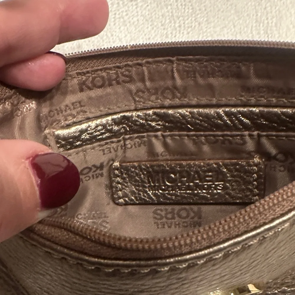 Michael Kors Shimmering Gold Wristlet‎